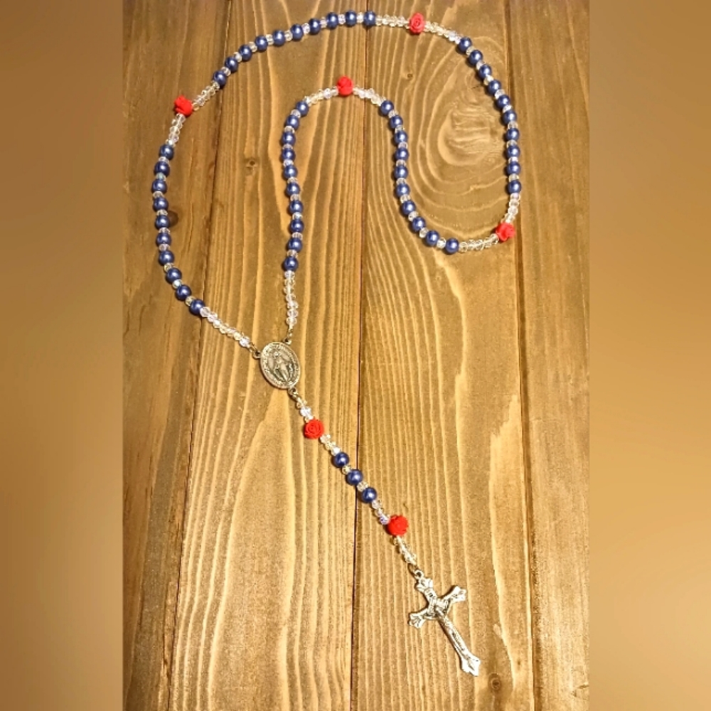 Rosary Necklace made with Blue glass pearls, clear crystals and red Rose beads.